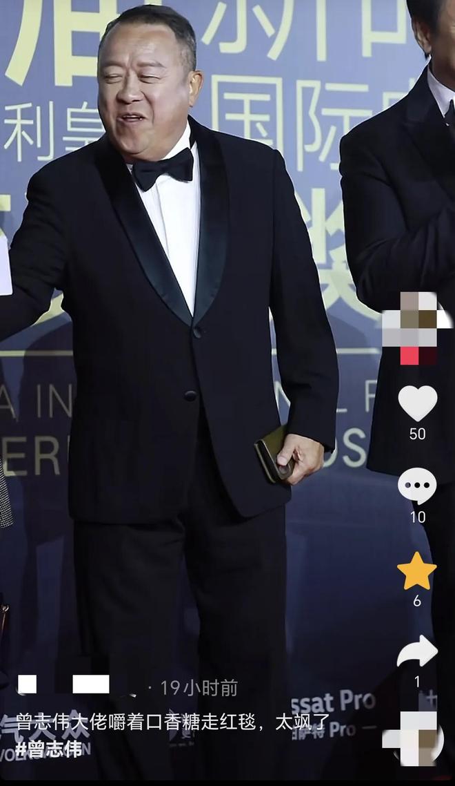 嚼口香糖与金沙总裁骑旋转木马挺幼稚m6米乐曾志伟澳门参加电影节台上(图6)